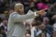 Cleveland Cavaliers interim head coach Larry Drew calls a play against the Dallas Mavericks during the second half of an NBA basketball game in Cleveland, Sunday, April 1, 2018. (AP Photo/Phil Long)