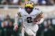 EAST LANSING, MI - OCTOBER 20: Shea Patterson #2 of the Michigan Wolverines runs the ball in the second half while playing the Michigan State Spartans at Spartan Stadium on October 20, 2018 in East Lansing, Michigan. Michigan won the game 21-7. (Photo by Gregory Shamus/Getty Images)