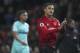 Manchester United's Alexis Sanchez walks from the pitch as he applauds the fans after the end of the English Premier League soccer match between Manchester United and Newcastle United at Old Trafford in Manchester, England, Saturday, Oct. 6, 2018. Man Utd won the game 3-2, with Sanchez scoring a late winner.(AP Photo/Jon Super)