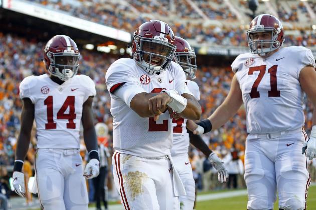 Alabama quarterback Jalen Hurts (2) celebrates after scoring a touchdown in the second half of an NCAA college football game against Tennessee Saturday, Oct. 20, 2018, in Knoxville, Tenn. Alabama won 58-21. (AP Photo/Wade Payne)