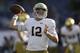 Notre Dame quarterback Ian Book warms up before facing Navy in an NCAA college football game Saturday, Oct. 27, 2018, in San Diego. (AP Photo/Gregory Bull)
