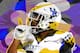 Kentucky running back Benny Snell Jr. (26) greets fans during a pep rally before an NCAA college football game iagainst South Carolina in Lexington, Ky., Saturday, Sept. 29, 2018. (AP Photo/Bryan Woolston)