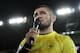 In this photo taken on Friday, Oct. 19, 2018, UFC lightweight champion Khabib Nurmagomedov delivers a speech to support Anzhi Makhachkala's players before the Russian Primer League soccer match between CSKA Moscow and Anzhi Makhachkala in Makhachkala, Russia. From 2011 to 2013, Anzhi’s vast spending made waves around the world as the likes of Samuel Eto’o and Roberto Carlos came to play in a region until then better known for its Islamist insurgency, but now Anzhi Makhachkala is struggling to survive. (AP Photo/Denis Tyrin)