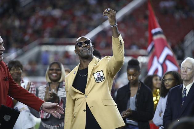 Former NFL wide receiver Terrell Owens holds up his Pro Football Hall of Fame ring during halftime of an NFL football game between the San Francisco 49ers and the Oakland Raiders in Santa Clara, Calif., Thursday, Nov. 1, 2018. (AP Photo/Ben Margot)