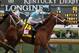 Florent Geroux rides Monomoy Girl to victory during the 144th running of the Kentucky Oaks horse race at Churchill Downs Friday, May 4, 2018, in Louisville, Ky. (AP Photo/Garry Jones)