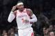 L’attaquant Carmelo Anthony (7 ans) des Houston Rockets réagit après avoir marqué un panier de trois points en deuxième partie d’un match de basket de la NBA contre les Brooklyn Nets, le vendredi 2 novembre 2018 à New York. (Photo AP / Mary Altaffer)