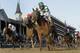 Joel Rosario rides Accelerate to victory in the Breeders' Cup Classic horse race at Churchill Downs, Saturday, Nov. 3, 2018, in Louisville, Ky. (AP Photo/Darron Cummings)