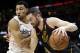 Kevin Love of the Cleveland Cavaliers, right, passes in front of Otto Porter Jr. of the Washington Wizards in the first half of an NBA basketball game on Thursday, April 5, 2018 in Cleveland. (AP Photo / Tony Dejak)