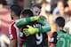 Manchester United's Spanish goalkeeper David de Gea embraces Manchester United's French striker Anthony Martial (2nd L) after the English Premier League football match between Southampton and Manchester United at St Mary's Stadium in Southampton, southern England on September 20, 2015. Manchester United won the game 3-2. AFP PHOTO / IAN KINGTON
RESTRICTED TO EDITORIAL USE. No use with unauthorized audio, video, data, fixture lists, club/league logos or 'live' services. Online in-match use limited to 75 images, no video emulation. No use in betting, games or single club/league/player publications. (Photo credit should read IAN KINGTON/AFP/Getty Images)