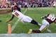 Atlanta Falcons wide receiver Julio Jones (11) dives past Washington Redskins free safety Ha Ha Clinton-Dix (20) and into the end zone for a touchdown during the second half of an NFL football game, Sunday, Nov. 4, 2018 in Landover, Md. (AP Photo/Susan Walsh)