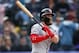 Washington Nationals' Bryce Harper follows the flight of his double off Colorado Rockies relief pitcher Chris Rusin in the ninth inning of a baseball game Sunday, Sept. 30, 2018, in Denver. The Rockies won 12-0. (AP Photo/David Zalubowski)