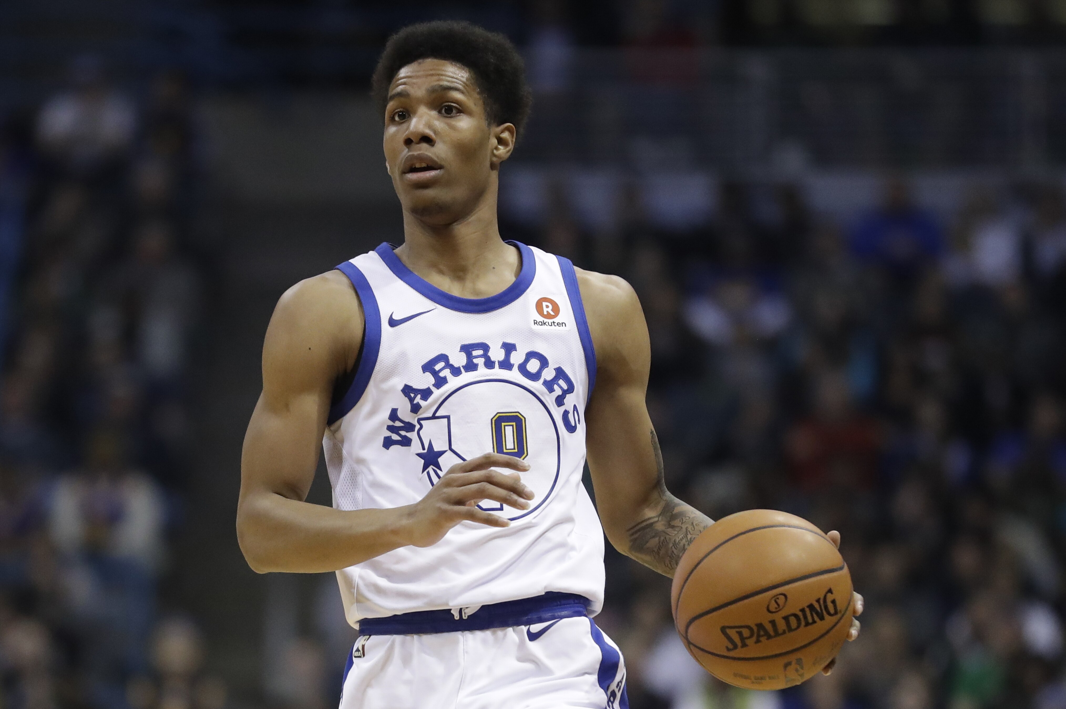 Golden State Warriors' Patrick McCaw dribbles during the first half of an NBA basketball game against the Milwaukee Bucks Friday, Jan. 12, 2018, in Milwaukee. (AP Photo/Morry Gash)