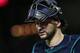 Seattle Mariners catcher Mike Zunino walks towards the dugout against the Texas Rangers after the fifth inning a of a baseball game Friday, Sept. 21, 2018, in Arlington, Texas. (AP Photo/Mike Stone)