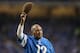 DETROIT, MI - DECEMBER 16: Former Detroit Lions player Wallace 'Wally' Triplett waves to the fans during the game against the Baltimore Ravens at Ford Field on December 16, 2013 in Detroit, Michigan. Wally Triplett was only the third African-American chosen in the1949 NFL Draft and was the first of the draftees to take the field in a league game. The Ravens defeated the Lions 18-16. (Photo by Leon Halip/Getty Images)