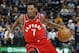Toronto Raptors guard Kyle Lowry (7) drives against the Utah Jazz in the first half during an NBA preseason basketball game Tuesday, Oct. 2, 2018, in Salt Lake City. (AP Photo/Rick Bowmer)