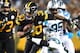 PITTSBURGH, PA - NOVEMBER 08: James Conner #30 of the Pittsburgh Steelers carries the ball against Eric Reid #25 of the Carolina Panthers during the first half in the game at Heinz Field on November 8, 2018 in Pittsburgh, Pennsylvania. (Photo by Joe Sargent/Getty Images)