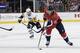 Washington Capitals center Nicklas Backstrom (19), of Sweden, skates with the puck in front of Pittsburgh Penguins center Sidney Crosby (87) during the first period of an NHL hockey game, Wednesday, Nov. 7, 2018, in Washington. (AP Photo/Nick Wass)