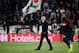 Manchester United's Portuguese manager Jose Mourinho (C) walks across the pitch next to Manchester United's French striker Anthony Martial prior to the UEFA Champions League group H football match Juventus vs Manchester United at the Allianz stadium in Turin on November 7, 2018. (Photo by Marco BERTORELLO / AFP) (Photo credit should read MARCO BERTORELLO/AFP/Getty Images)