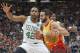 Boston Celtics center Al Horford (42) guards Utah Jazz guard Ricky Rubio (3) as he drives in the first half during an NBA basketball game Friday Nov. 9, 2018, in Salt Lake City. (AP Photo/Rick Bowmer)