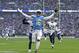Los Angeles Chargers wide receiver Tyrell Williams (16) celebrates as he scores a touchdown during the first half of an NFL football game against Tennessee Titans at Wembley stadium in London, Sunday, Oct. 21, 2018. (AP Photo/Matt Dunham)