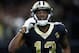 NEW ORLEANS, LA - NOVEMBER 04: Michael Thomas #13 of the New Orleans Saints pretends to make a call on a cell phone in celebration of scoring a touchdown in the fourth quarter of the game against the Los Angeles Rams at Mercedes-Benz Superdome on November 4, 2018 in New Orleans, Louisiana. (Photo by Wesley Hitt/Getty Images)