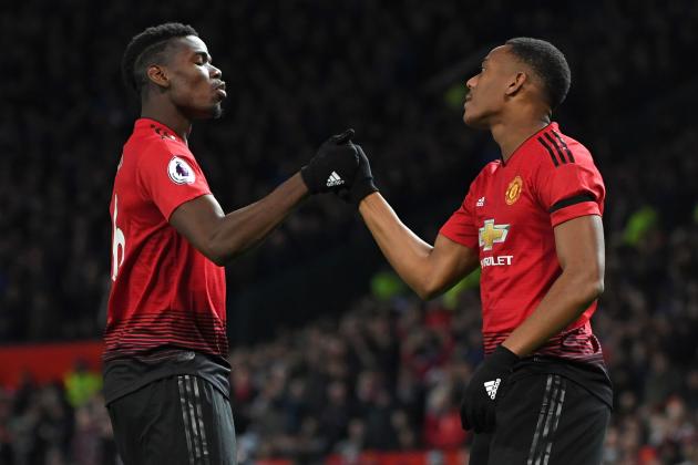 Manchester United's French striker Anthony Martial celebrates with Manchester United's French midfielder Paul Pogba (L) after scoring their second goal during the English Premier League football match between Manchester United and Everton at Old Trafford in Manchester, north west England, on October 28, 2018. (Photo by Paul ELLIS / AFP) / RESTRICTED TO EDITORIAL USE. No use with unauthorized audio, video, data, fixture lists, club/league logos or 'live' services. Online in-match use limited to 120 images. An additional 40 images may be used in extra time. No video emulation. Social media in-match use limited to 120 images. An additional 40 images may be used in extra time. No use in betting publications, games or single club/league/player publications. /         (Photo credit should read PAUL ELLIS/AFP/Getty Images)