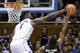 Duke's Zion Williamson,left, blocks a shot by Army's Josh Caldwell, right, during the second half of an NCAA college basketball game in Durham, N.C., Sunday, Nov. 11, 2018. Duke won 94-72. (AP Photo/Gerry Broome)