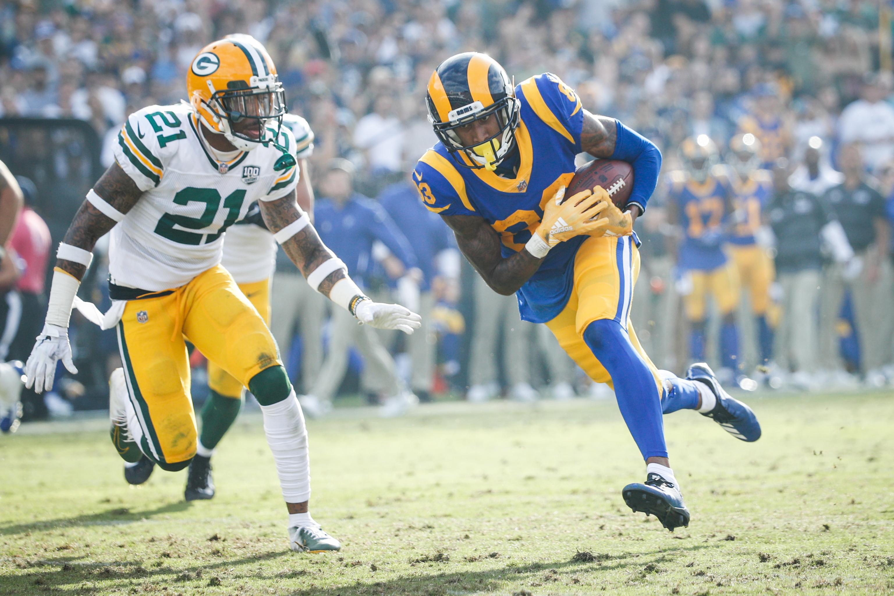 London, UK. 27 October 2019. Rams Wide Receiver, Josh Reynolds (83)  celebrates with Rams Tight End, Gerald Everett (81) and Rams Tight End,  Tyler Higbee (89) after scoring during the NFL match