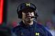 PISCATAWAY, NJ - NOVEMBER 10: Head coach Jim Harbaugh of the Michigan Wolverines coaches against the Rutgers Scarlet Knights during the third quarter at HighPoint.com Stadium on November 10, 2018 in Piscataway, New Jersey. Michigan won 42-7. (Photo by Corey Perrine/Getty Images)