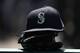 ANAHEIM, CA - JULY 29: A detailed view of a Seattle Mariners hat is seen on the dugout railing during the seventh inning of the MLB game between the Seattle Mariners and the Los Angeles Angels of Anaheim at Angel Stadium on July 29, 2018 in Anaheim, California. The Mariners defeated the Angels 8-5. (Photo by Victor Decolongon/Getty Images)