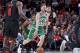 Boston Celtics forward Gordon Hayward, left, brings the ball in the yard in front of the Portland Trail Blazers Center in Nurkic Yusuf during the second half of the NBA basketball game in Portland, Ora, Sunday, 11 November 2018. Trail Blazer won 100-94. (AP Photo / Craig Mitchelldyer)