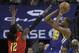 Golden State Warriors striker Kevin Durant (35) shoots Atlanta Hawks striker Taurean Prince (12) during the first half of an NBA basketball game in Oakland, California, Tuesday, November 13, 2018. (AP Photo / Jeff Chiu)