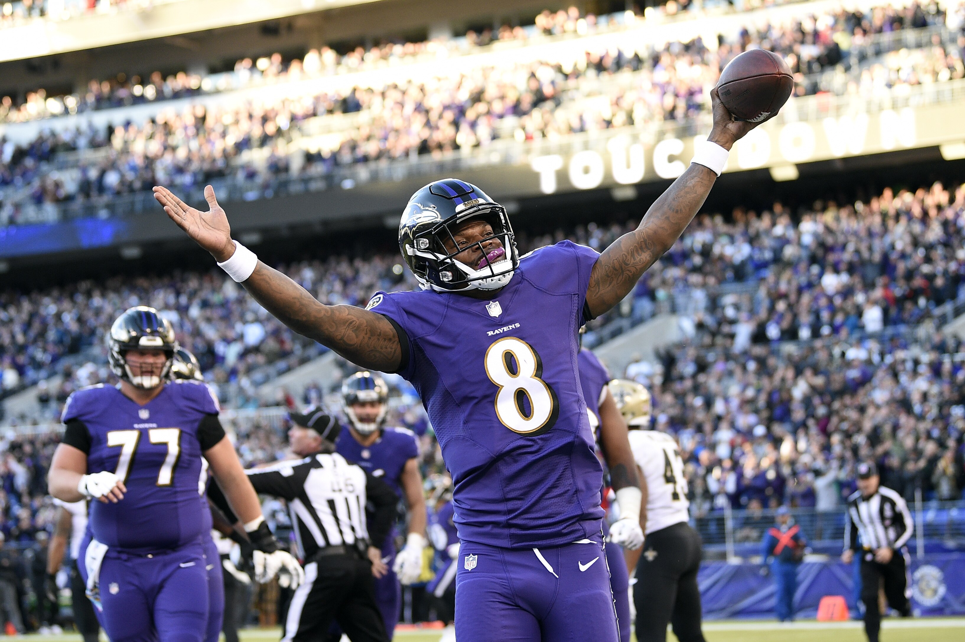 Baltimore Ravens quarterback Lamar Jackson celebrates after scoring a touchdown in the first half of an NFL football game against the New Orleans Saints, Sunday, Oct. 21, 2018, in Baltimore. (AP Photo/Nick Wass)