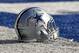 A Dallas Cowboys helmet is seen on the field before an NFL football game against the New York Giants at MetLife Stadium in East Rutherford, NJ, Sunday, Dec. 10, 2017. (Winslow Townson/AP Images for Panini)