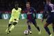 PSG's Neymar, center, controls the ball ahead of LOSC Lille's Nicolas Pepe, left, during to the League One soccer match between Paris Saint-Germain and Lille at the Parc des Princes stadium in Paris, Friday, Nov. 2, 2018. (AP Photo/Thibault Camus)