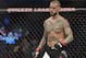 FILE - In this Saturday, Sept. 10, 2016 file photo, CM Punk stands in his corner before a welterweight bout at UFC 203 in Cleveland. CM Punk won the fight of his life this week when he was cleared by a jury of defamation and invasion of privacy in a lawsuit brought by a wrestling doctor. But he still has a big one ahead when he fights at UFC 225 in Chicago. (AP Photo/David Dermer, File)
