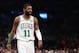 BOSTON, MA - NOVEMBER 14: Kyrie Irving #11 of the Boston Celtics reacts during the first half against the Chicago Bulls at TD Garden on November 14, 2018 in Boston, Massachusetts. (Photo by Tim Bradbury/Getty Images)