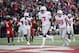 Ohio State quarterback Dwayne Haskins Jr. (7) celebrates his touchdown next to tight end Luke Farrell (89) and wide receiver Binjimen Victor (9) during the overtime of an NCAA football game as Maryland defensive back Darnell Savage Jr. (4) looks on at left, Saturday, Nov. 17, 2018, in College Park, Md. Ohio State won 52-51. (AP Photo/Nick Wass)