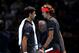 LONDON, ENGLAND - NOVEMBER 18: Alexander Zverev of Germany and Novak Djokovic of Serbia cross paths after the first set during their singles final during Day Eight of the Nitto ATP Finals at The O2 Arena on November 18, 2018 in London, England. (Photo by Julian Finney/Getty Images)