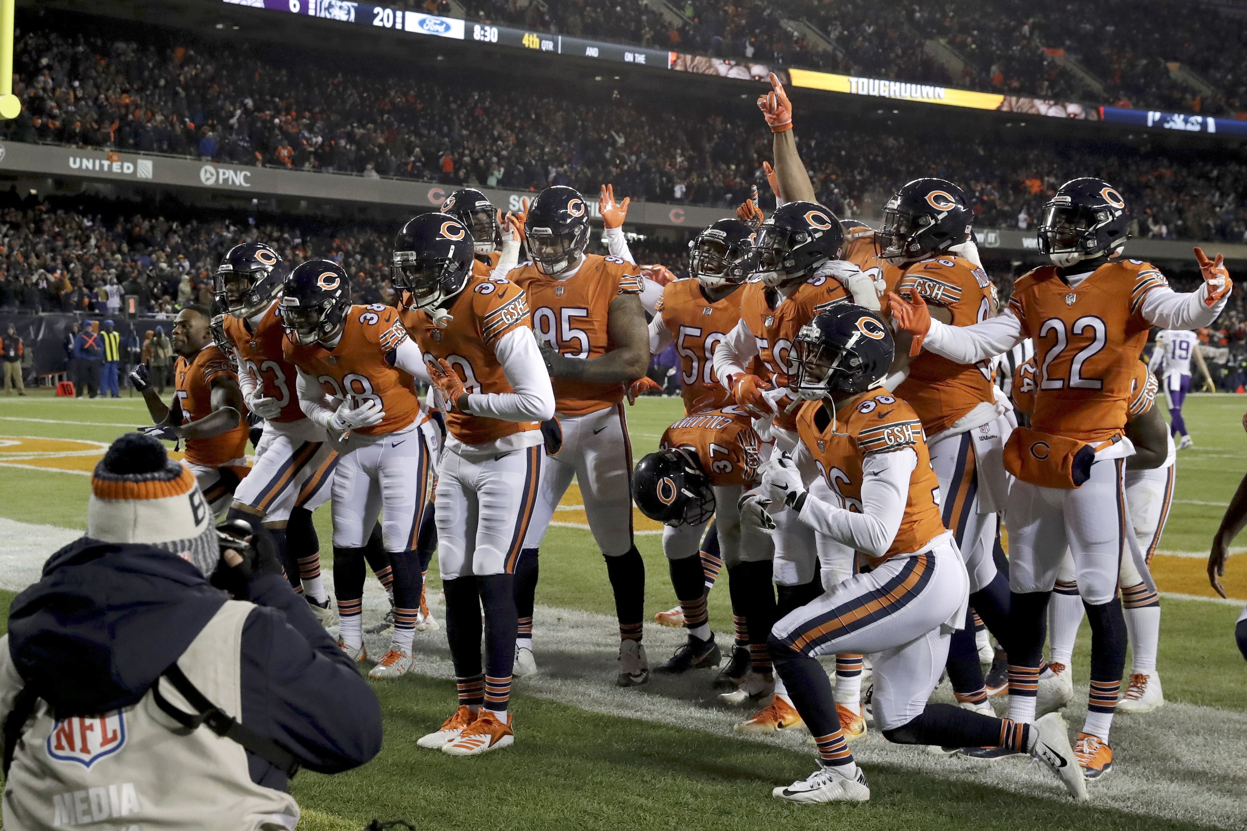 Chicago Bears free safety Eddie Jackson (39) celebrates with his teammates after intercepting and running for a touchdown during the second half of an NFL football game against the Minnesota Vikings Sunday, Nov. 18, 2018, in Chicago. (AP Photo/Nam Y. Huh)