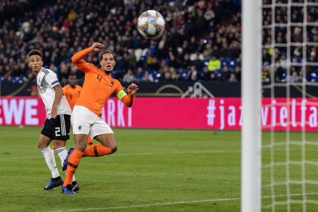 GELSENKIRCHEN, GERMANY - NOVEMBER 19: Virgil Van Dijk of the Netherlands scores his team's second goal during the UEFA Nations League A group one match between Germany and Netherlands at Veltins-Arena on November 19, 2018 in Gelsenkirchen, Germany. (Photo by Boris Streubel/Getty Images)