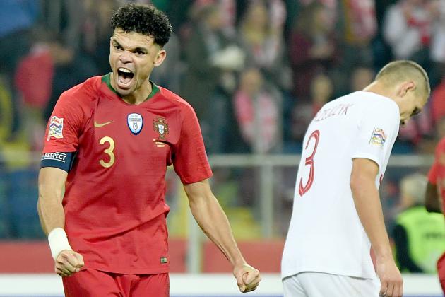TOPSHOT - Portugal's defender Pepe (L) react at the end of the UEFA Nations League football match Poland v Portugal at the Slaski Stadium in Chorzow, Poland on October 11, 2018. (Photo by Janek SKARZYNSKI / AFP)        (Photo credit should read JANEK SKARZYNSKI/AFP/Getty Images)