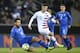 Italy's defender Francesco Acerbi (L) and Unites States' midfielder Christian Pulisic (R) vie for the ball during the friendly football match between Italy and the USA at the Luminus Arena Stadium in Genk on November 20, 2018. (Photo by JOHN THYS / AFP) (Photo credit should read JOHN THYS/AFP/Getty Images)
