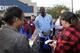 Charlotte Hornets owner Michael Jordan greets people and hands out food for Thanksgiving to members of the community in Wilmington, N.C., Tuesday, Nov. 20, 2018. (AP Photo/Gerry Broome)