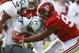 Citadel quarterback Brandon Rainey (16) is stopped by Alabama defensive lineman Quinnen Williams (92) as he tries to carry the ball during the second half of an NCAA college football game, Saturday, Nov. 17, 2018, in Tuscaloosa, Ala. (AP Photo/Butch Dill)