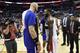 Washington Wizards guard John Wall, right, laughs with Los Angeles Clippers center Marcin Gortat, left, of Poland, after an NBA basketball game, Tuesday, Nov. 20, 2018, in Washington. The Wizards won 125-118. (AP Photo/Nick Wass)