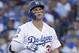Los Angeles Dodgers' Joc Pederson reacts after striking out during the first inning of Game 3 of the National League Championship Series baseball game against the Milwaukee Brewers Monday, Oct. 15, 2018, in Los Angeles. (AP Photo/Jae Hong)