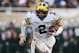 EAST LANSING, MI - OCTOBER 20: Shea Patterson #2 of the Michigan Wolverines runs the ball in the second half while playing the Michigan State Spartans at Spartan Stadium on October 20, 2018 in East Lansing, Michigan. Michigan won the game 21-7. (Photo by Gregory Shamus/Getty Images)