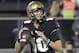 Central Florida quarterback McKenzie Milton (10) sets up to throw a pass during the first half of an NCAA college football game against Cincinnati, Saturday, Nov. 17, 2018, in Orlando, Fla. (AP Photo/Phelan M. Ebenhack)