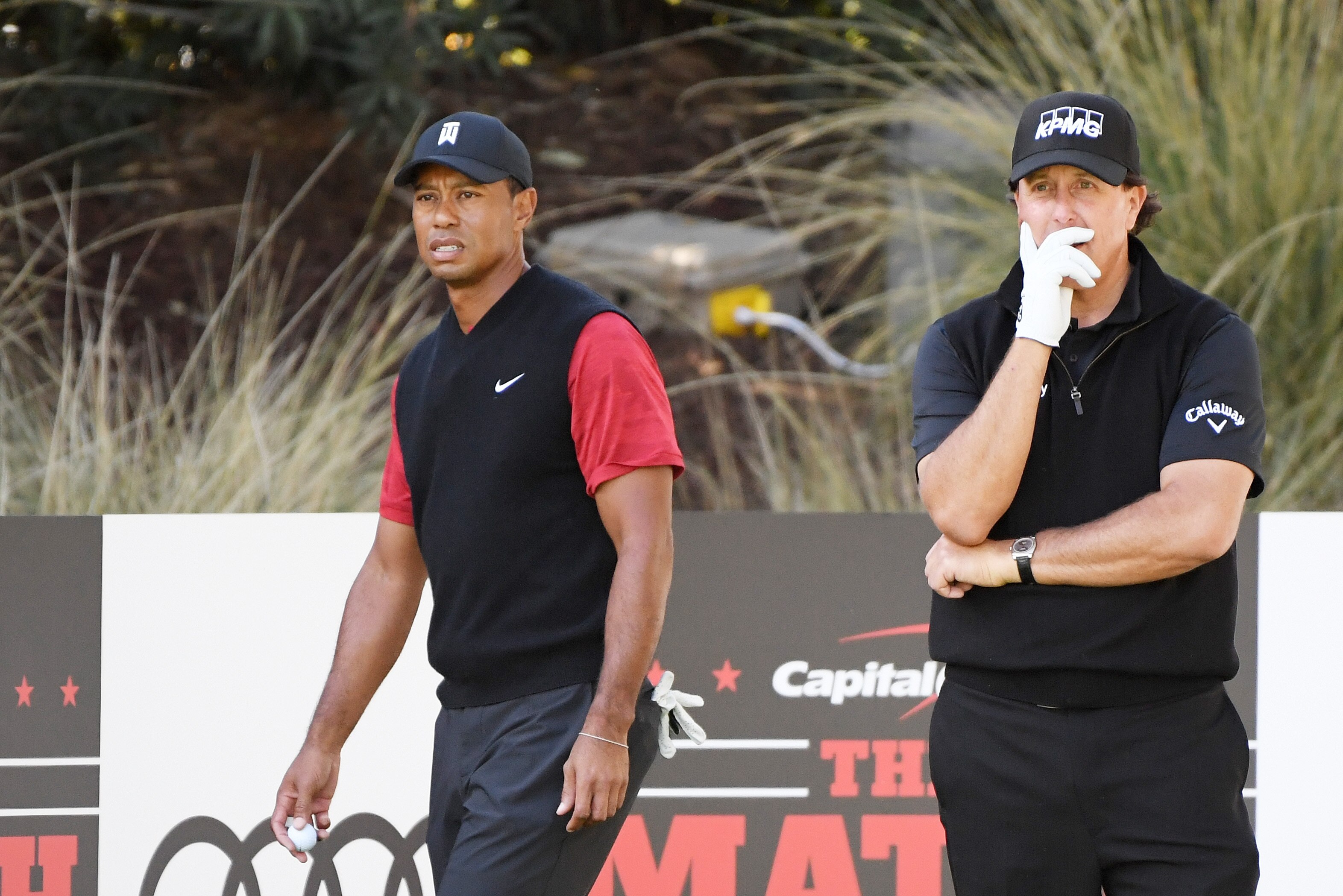 LAS VEGAS, NV - NOVEMBER 23:  Tiger Woods and Phil Mickelson look on from the seventh tee during The Match: Tiger vs Phil at Shadow Creek Golf Course on November 23, 2018 in Las Vegas, Nevada.  (Photo by Harry How/Getty Images for The Match)